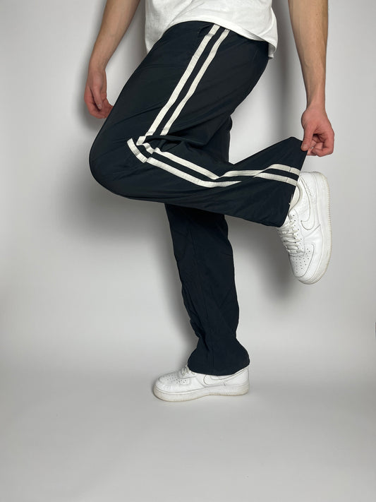 Nike Trackpants schwarz - 1Limit